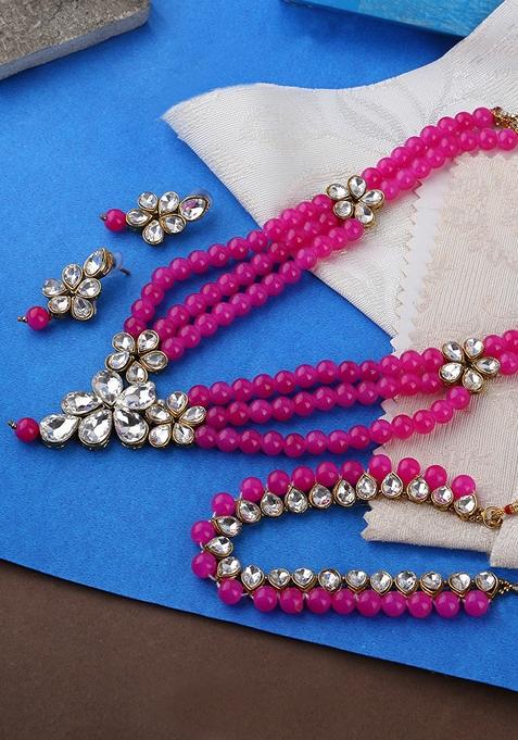 Gold Plated Pink And White Kundan Studded And Beaded Multi Stranded Jadau Jewellery Set