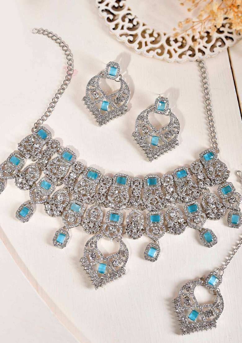 Light Blue Ad Studded Necklace With Earrings And Mangtikka - Indya