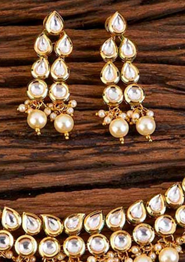 Golden And Cream Kundan Stone Work Alloy Necklace Set