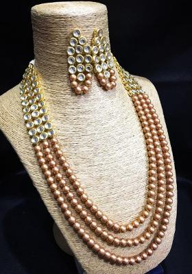 Golden And Cream Kundan Stone Work Alloy Necklace Set