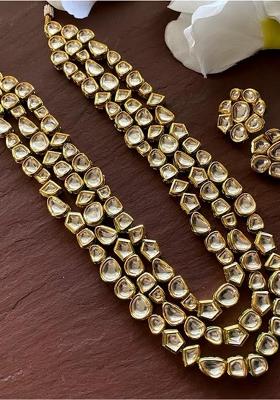 Off White Kundan Stone Work Alloy Necklace Set