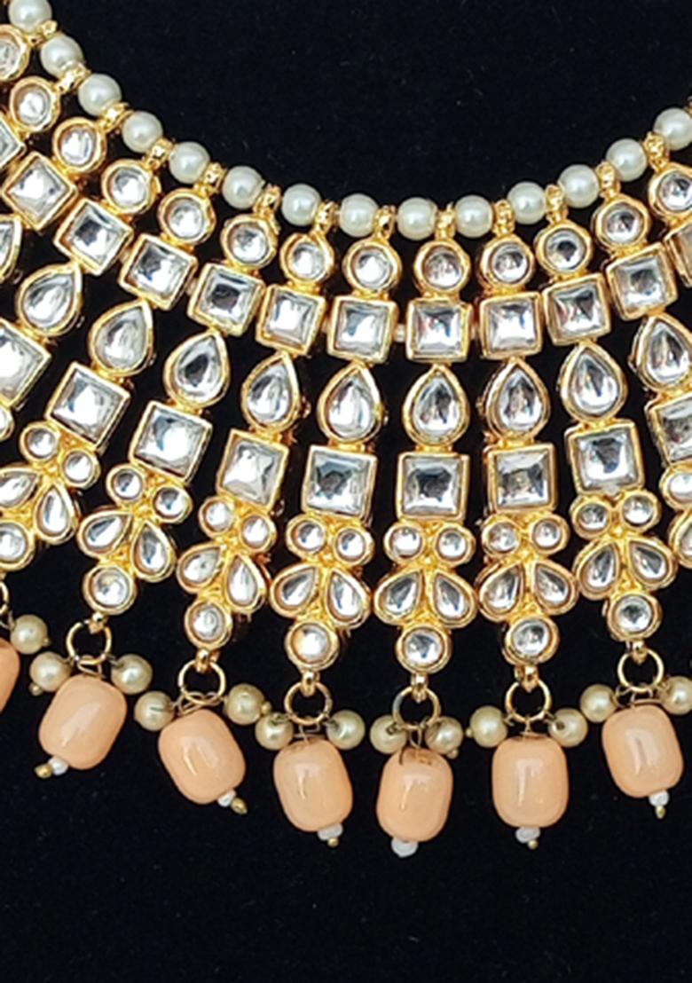 Cherry Red Kundan Stone Work Alloy Jewellery Set