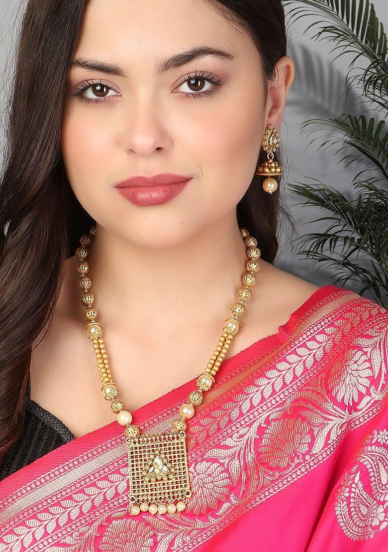 Gold Stone Studded And Beaded Gold Plated Jewellery Set