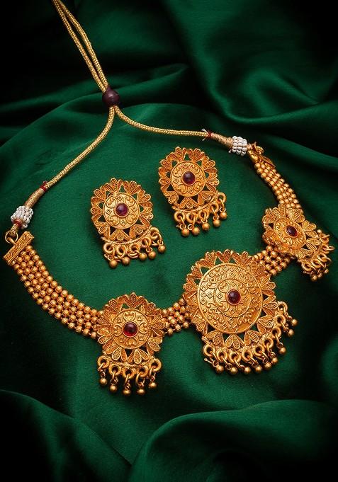 Gold Toned And Pink Ruby Studded And Ghungroo Beaded Temple Jewellery Set