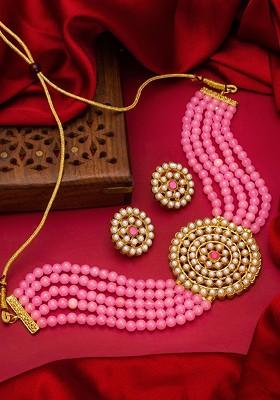 Gold Toned And Pink Kundan Studded And Pearl Beaded Handcrafted Jewellery Set