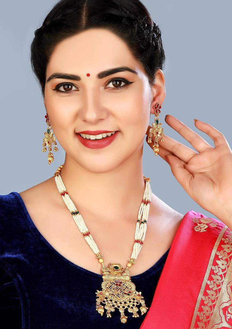 Gold Plated Green And White Stone Studded And Pearl Beaded Temple Jewellery Set