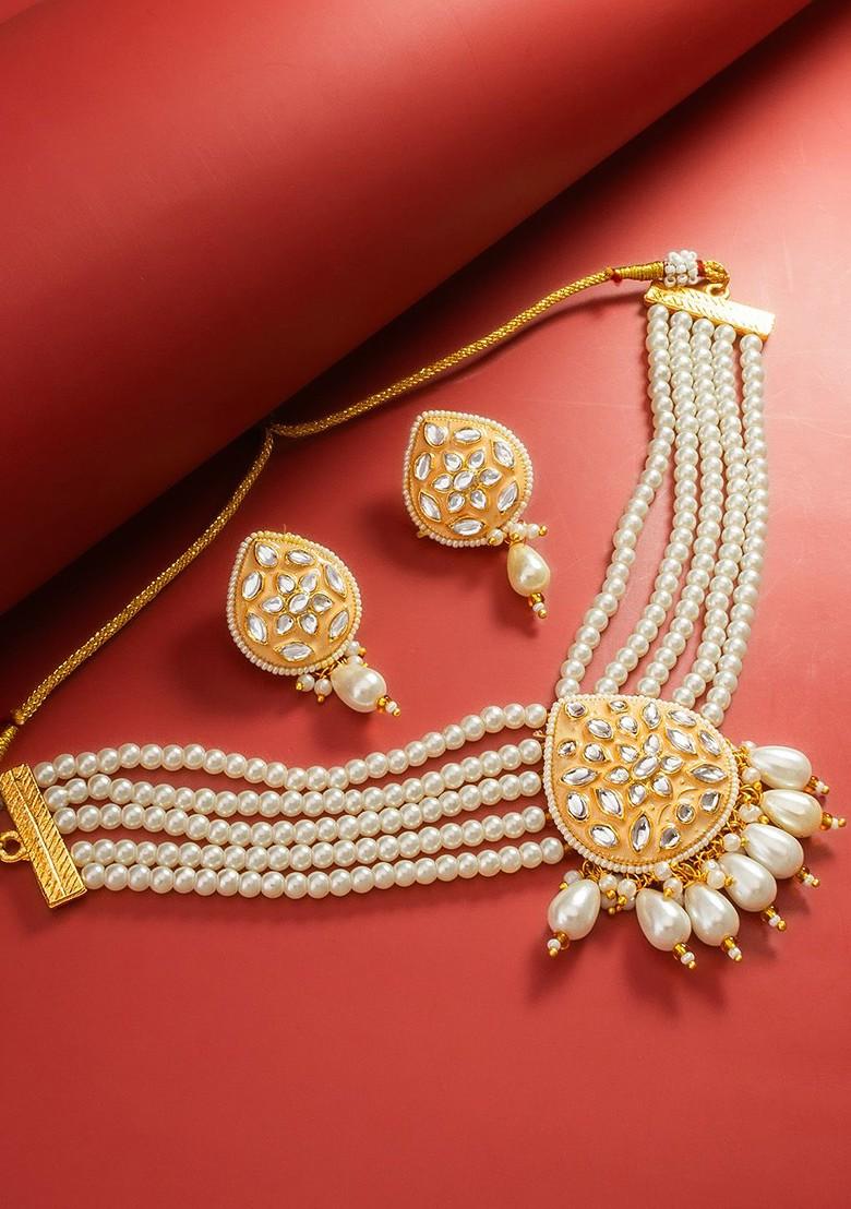 Gold Plated Kundan Studded And Pearls Beaded Jewellery Set