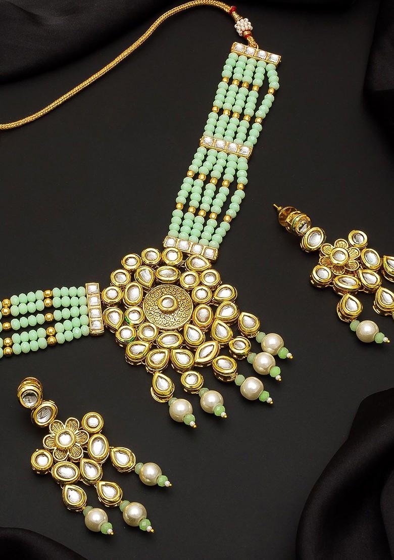 Gold Plated White And Green Kundan Studded Beaded Handcrafted Jewellery Set