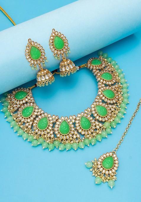 Gold Plated And Green Stone Studded And Pearl Beaded Jewellery Set