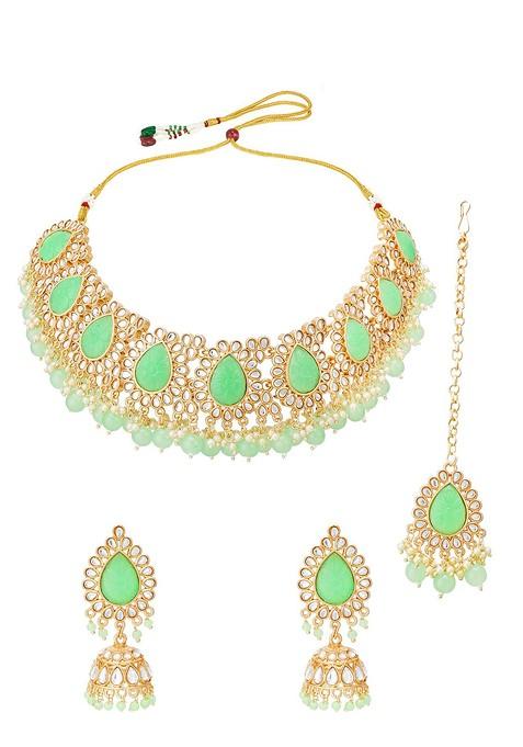 Gold Plated And Green Stone Studded And Pearl Beaded Jewellery Set