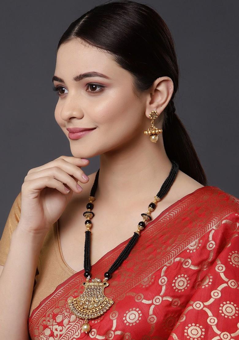 Gold Plated Black Beads Stone Studded Handcrafted Mangalsutra With Earrings