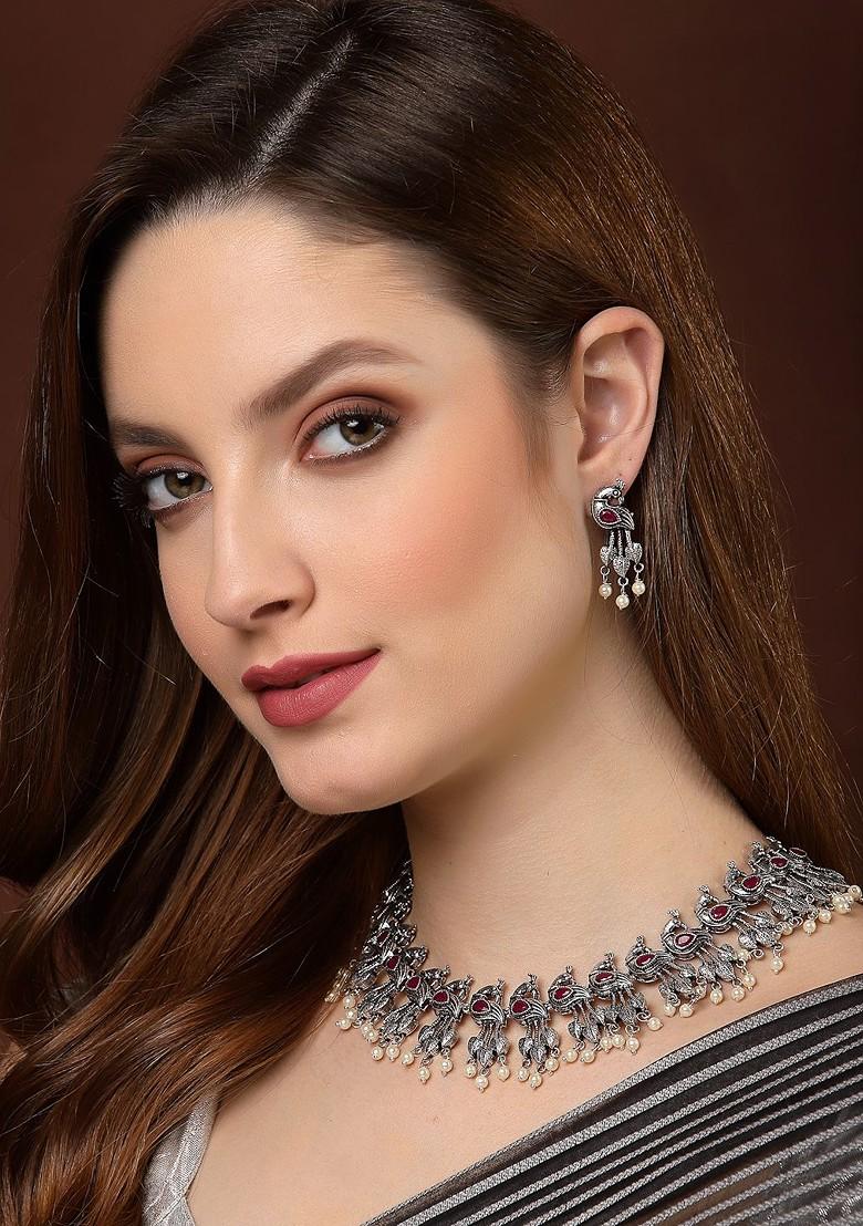 Silver Silver Toned And Pink Stones Studded And Beaded Oxidised Peacock Shaped Jewellery Set