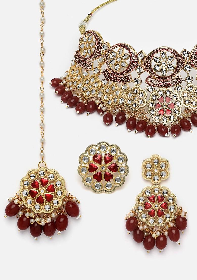 Gold Plated Kundan Stone Studded And Pearl Beaded Jewellery Set