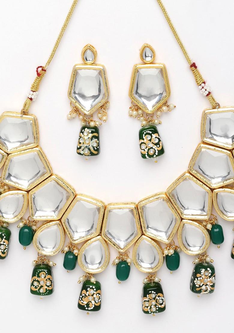Gold Plated Kundan Studded And Beaded Necklace And Earrings