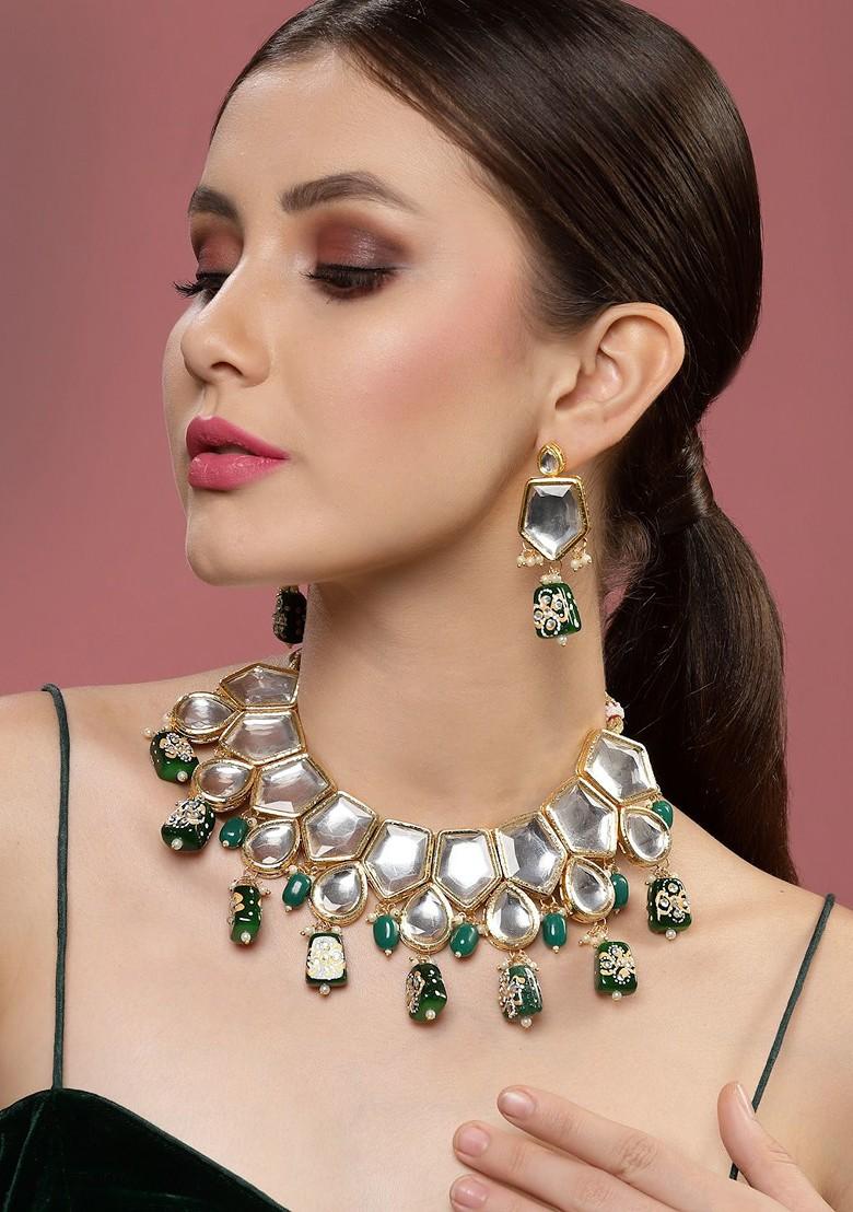 Gold Plated Kundan Studded And Beaded Necklace And Earrings