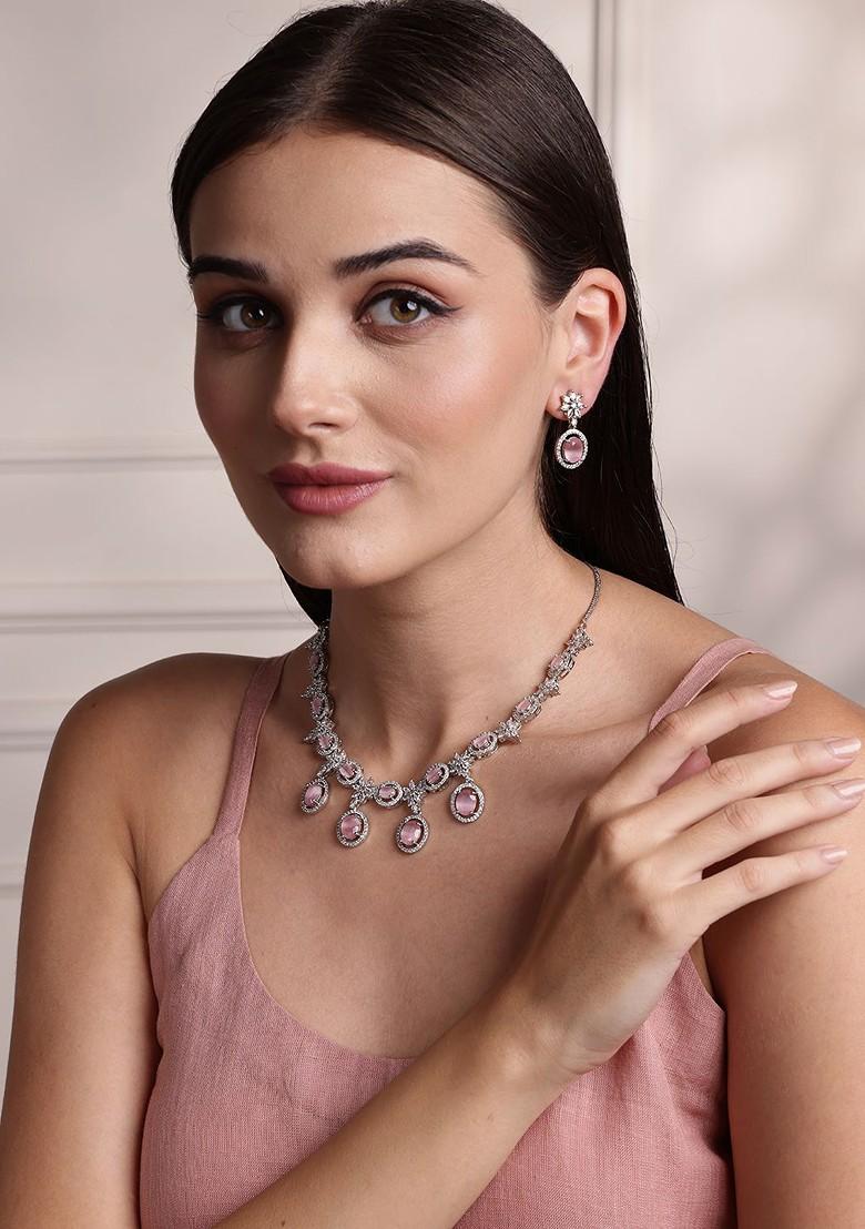 Silver Rhodium Plated Necklace Set With American Diamond And Pink Stone Accents