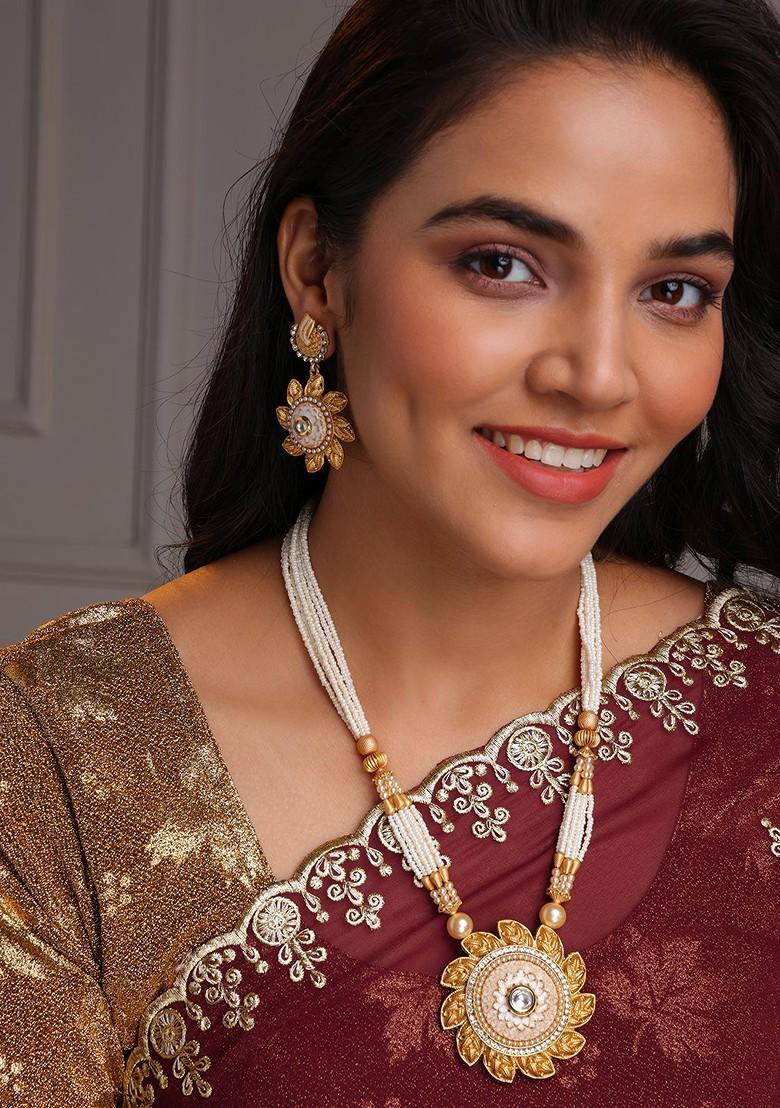 Gold Plated Cz Studded And Beaded Jewellery Set