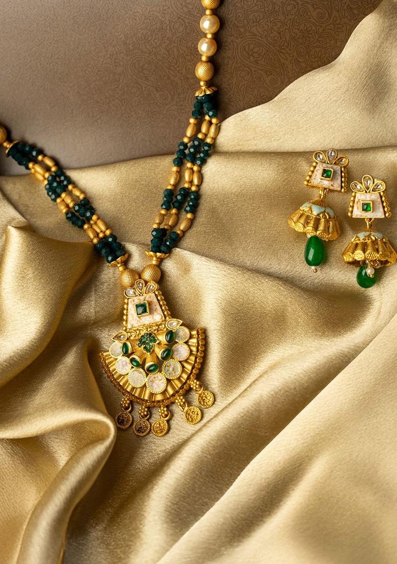 Gold Plated Stones Studded And Beaded Jewellery Set