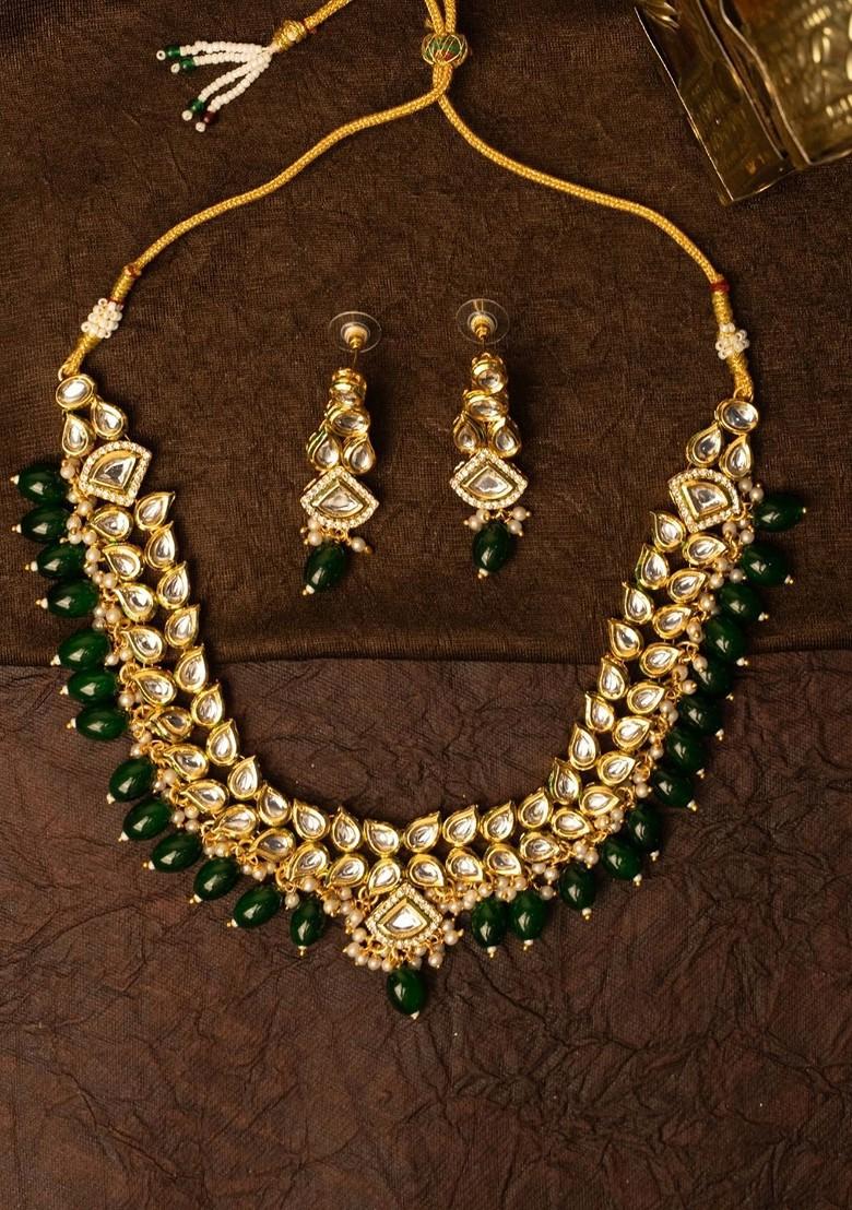 Gold Plated Kundan Stone Studded And Beaded Jewellery Set