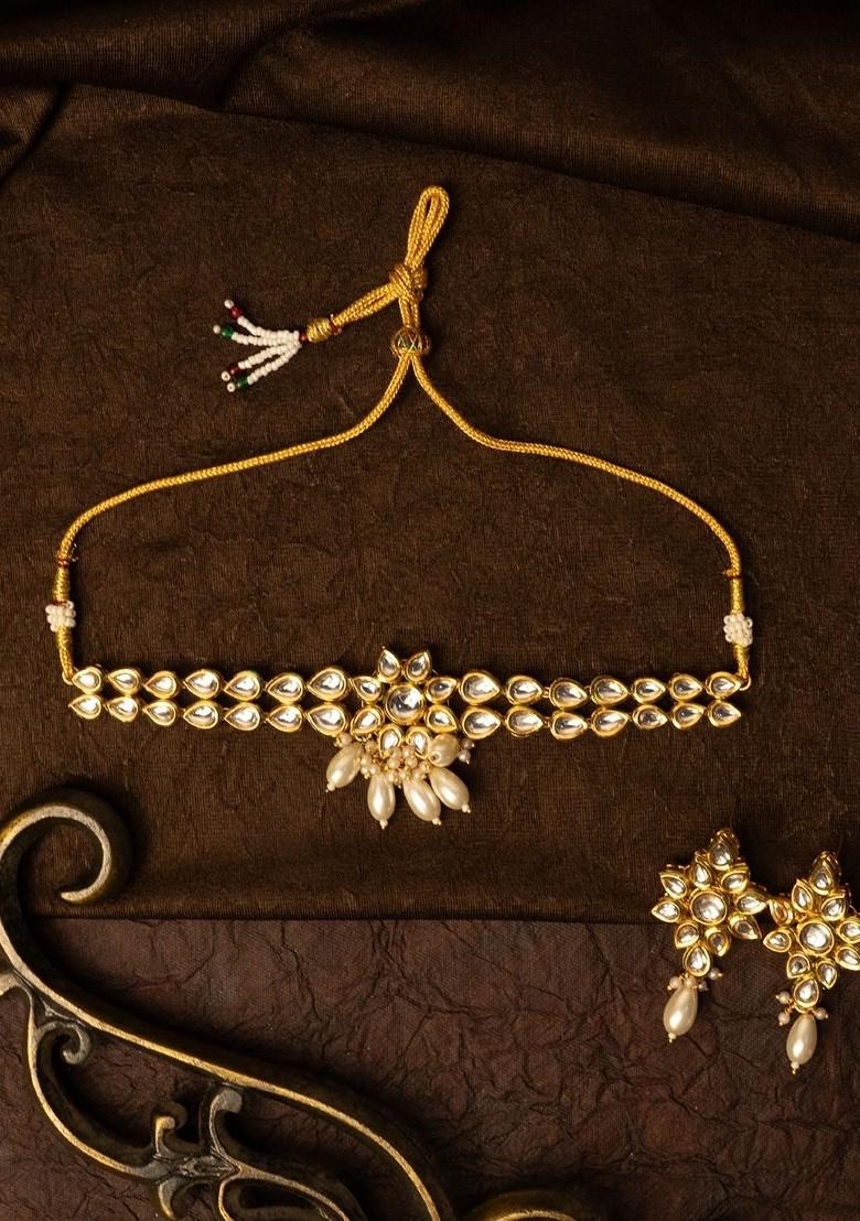 Gold Plated Kundan Stone Studded And Beaded Jewellery Set