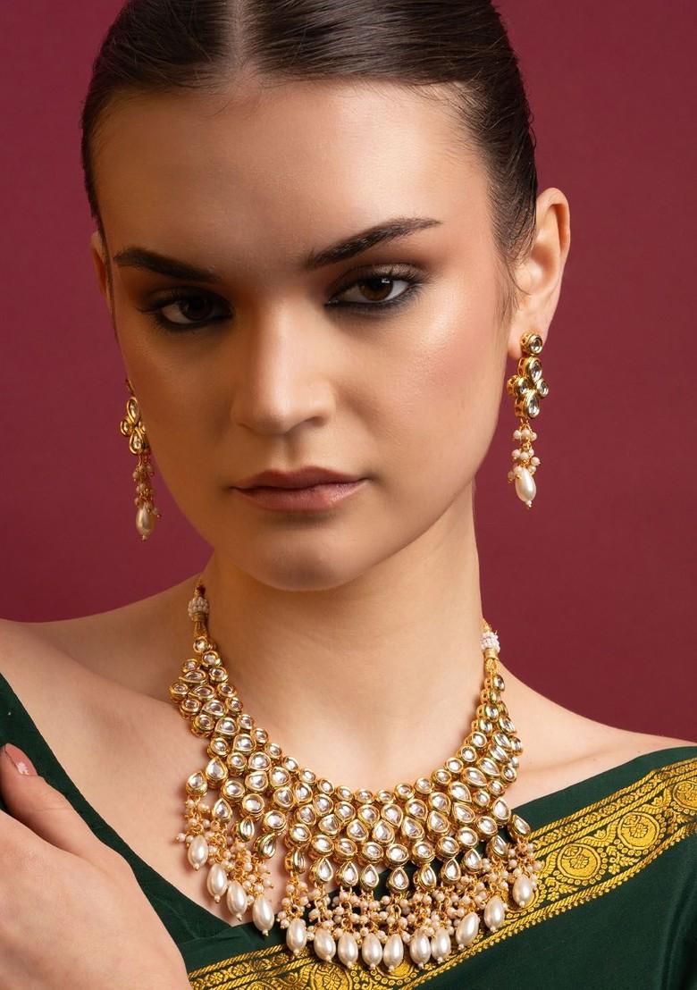 Gold Plated Kundan Stone Studded And Beaded Jewellery Set