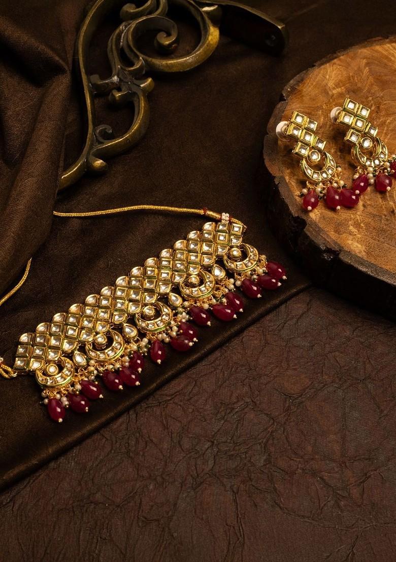 Gold Plated Kundan Stone Studded And Beaded Jewellery Set