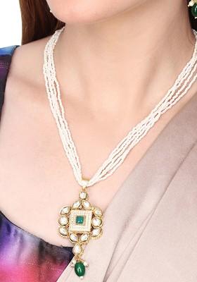 Gold Plated Kundan Studded And Beaded Necklace And Earrings
