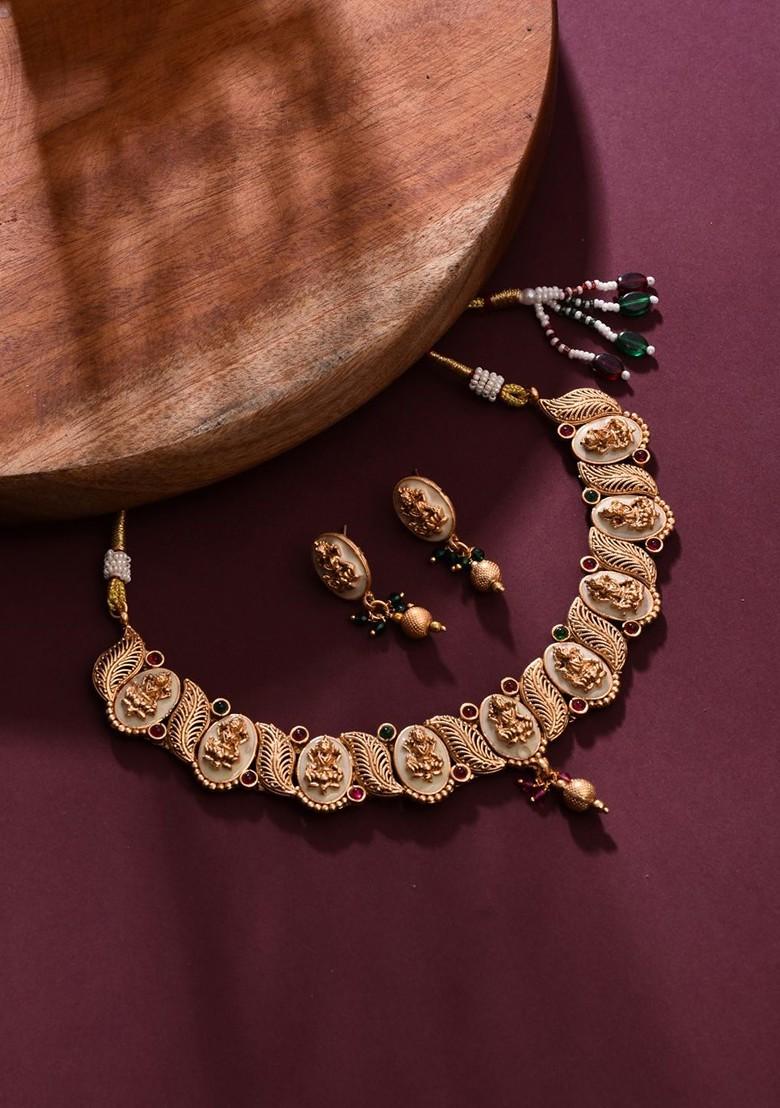 Gold Plated Stone Studded And Beaded Goddess Laxmi Necklace And Earrings