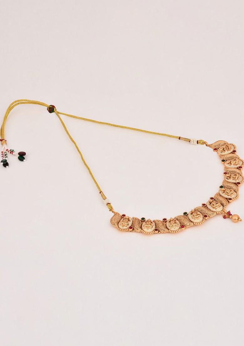 Gold Plated Stone Studded And Beaded Goddess Laxmi Necklace And Earrings