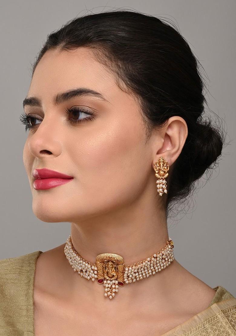 Gold Plated Artificial Stones Studded And Beaded Temple Neckless And Earrings