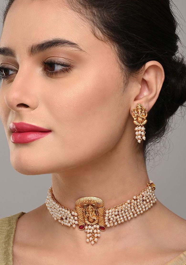 Gold Plated Artificial Stones Studded And Beaded Temple Neckless And Earrings