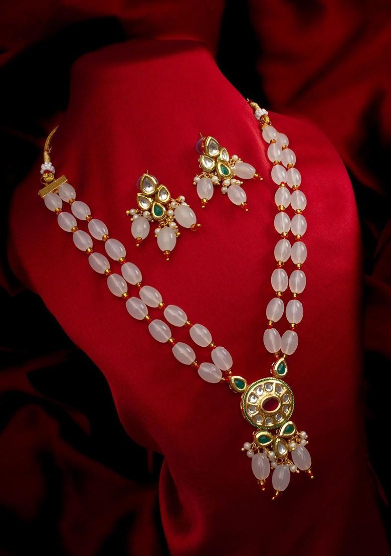 Kundan Studded And Beaded Necklace And Earrings