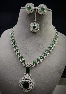 Silver Plated Ad Studded Necklace And Earrings With Maang Tika