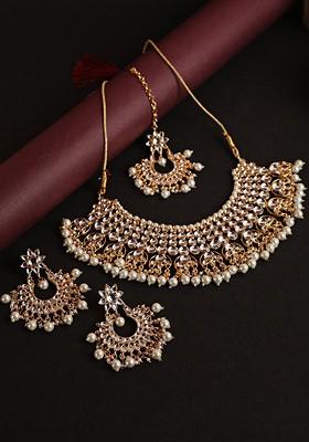 Gold Plated White Kundan And Bead Studdedvjewellery Set With Maang Tika