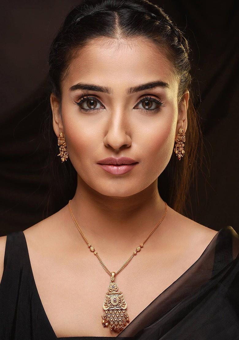 Gold Plated Stones Studded And Beaded Jewellery Set - Indya