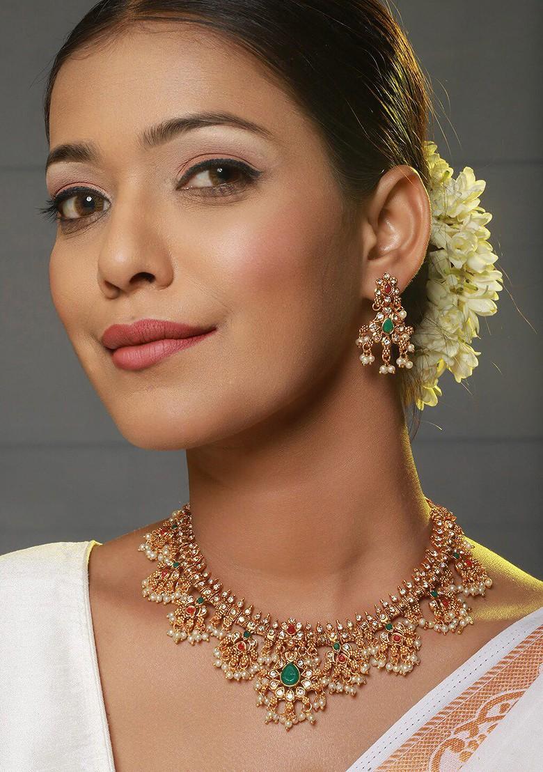 Gold Plated Stone Studded And Beaded Necklace And Earrings