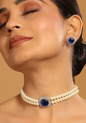 Rhodium Plated Pearls And Artificial Stones Studded Jewellery Set