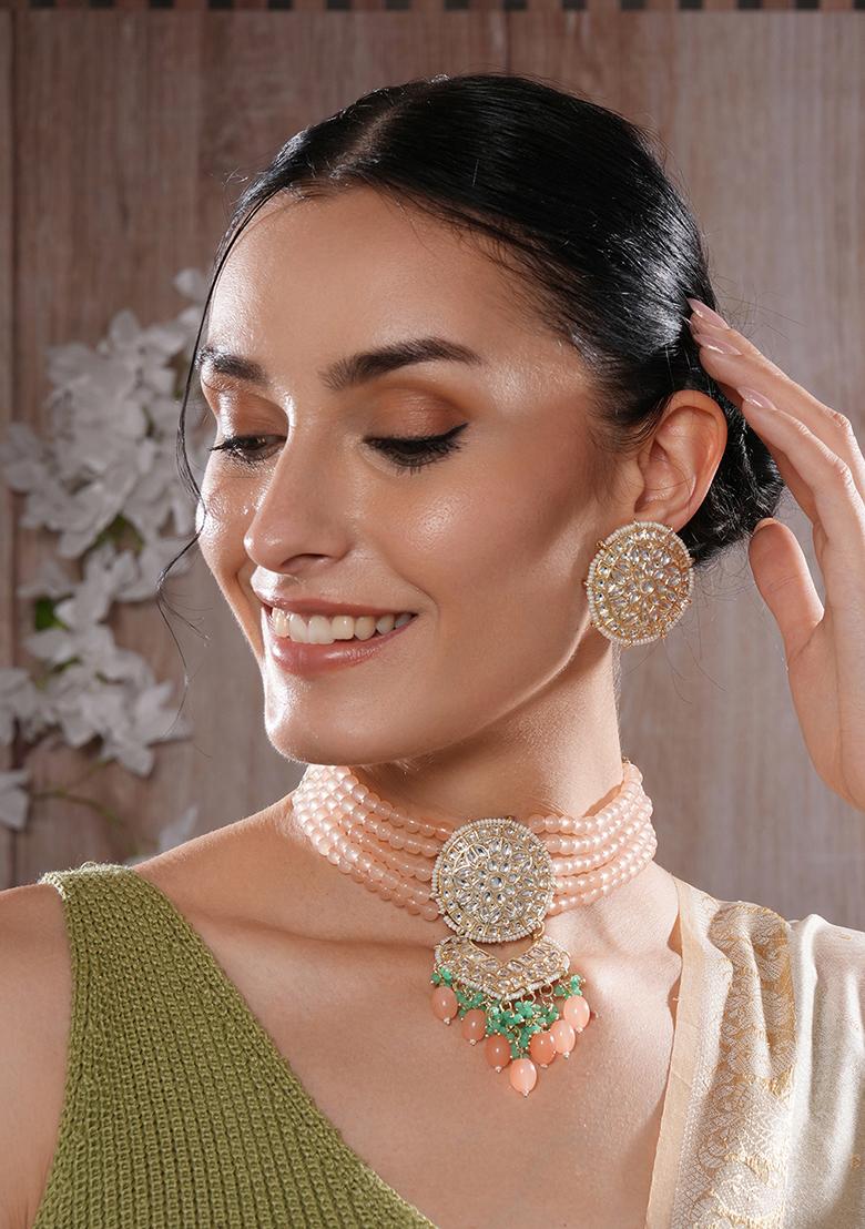 Gold Plated Kundan Studded And Beaded Necklace And Earrings Set
