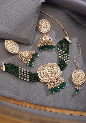 Gold Plated Kundan Studded And Beaded Necklace And Earrings Set With Maangtikka