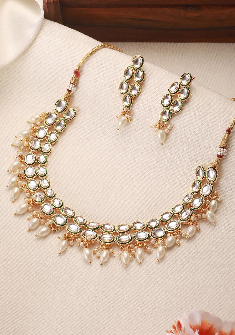 Gold Plated Kundan Studded And White Beaded Handcrafted Jewellery Set