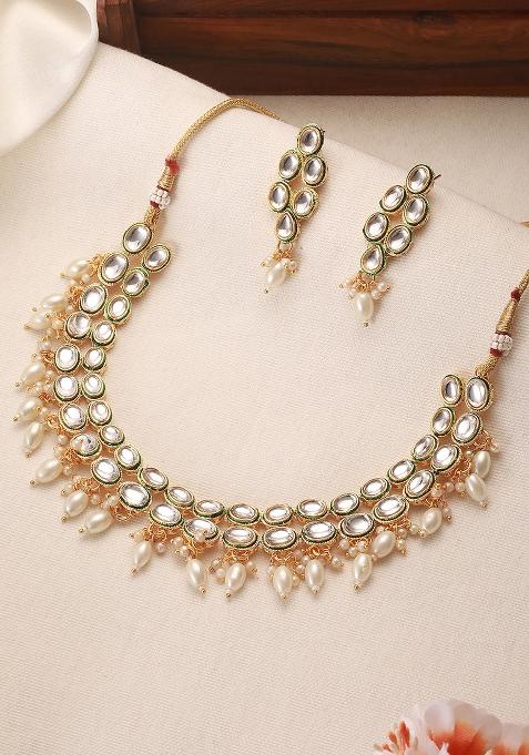 Gold Plated Kundan Studded And White Beaded Handcrafted Jewellery Set