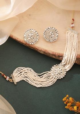 Gold Plated Kundan Studded And Beaded White Floral Necklace And Earrings Set