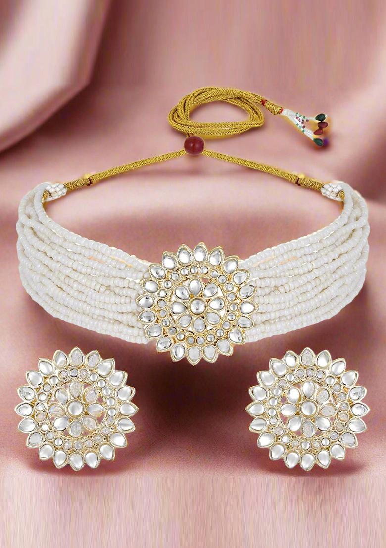 Gold Plated Kundan Studded And Beaded White Floral Necklace And Earrings Set