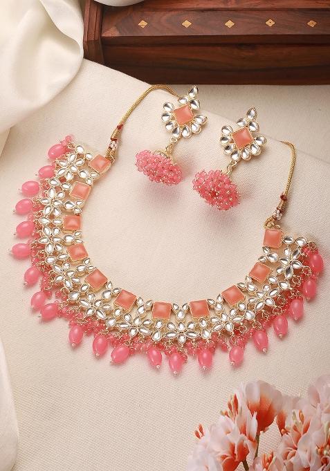 Gold Plated Peach Pink Kundan Studded And Beaded Necklace And Earrings Set