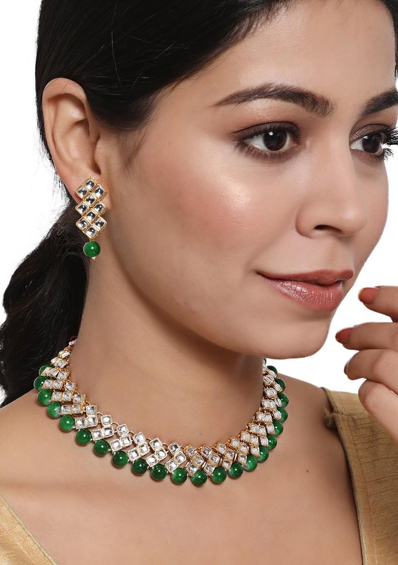 Women Gold Plated Green And White Kundan Studded And Beaded Jewellery Set