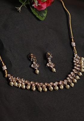 Gold Plated White Kundan Studded And Beaded Jewellery Set