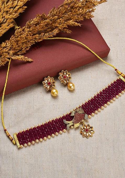 Gold Plated Maroon Stone Studded And Pearl Beaded Jewellery Set
