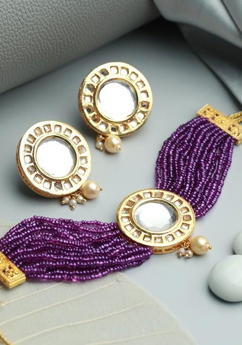 Women Gold Plated Purple Kundan Studded And Beaded Jewellery Set