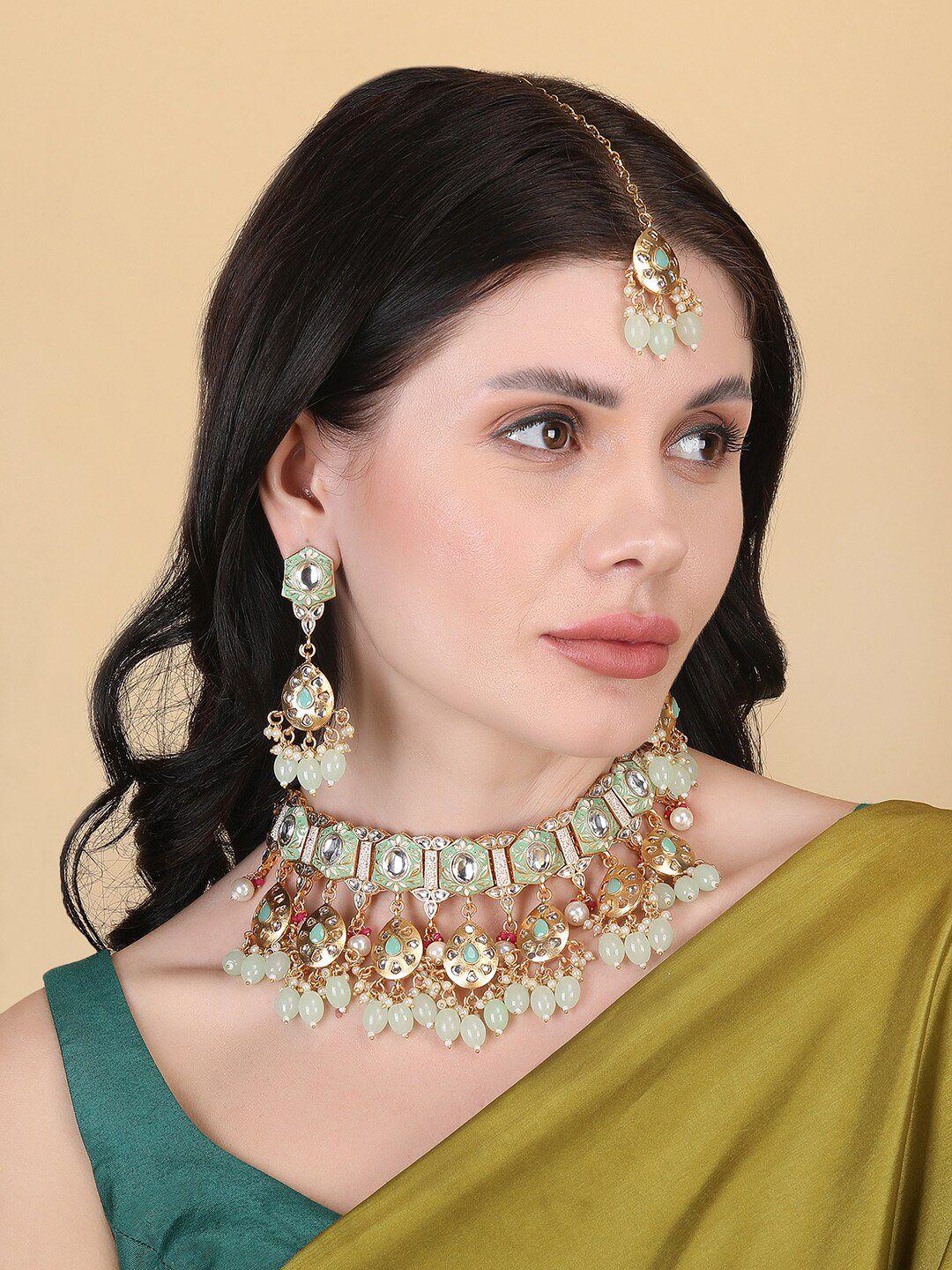 Gold Plated Kundan Studded And Beaded Necklace And Earrings With Maang Tika