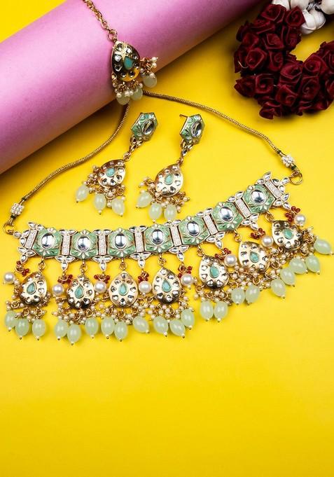 Gold Plated Kundan Studded And Beaded Necklace And Earrings With Maang Tika